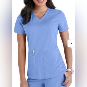 Grey’s Anatomy V-neck 2-pocket scrub top. Size small. Galaxy.